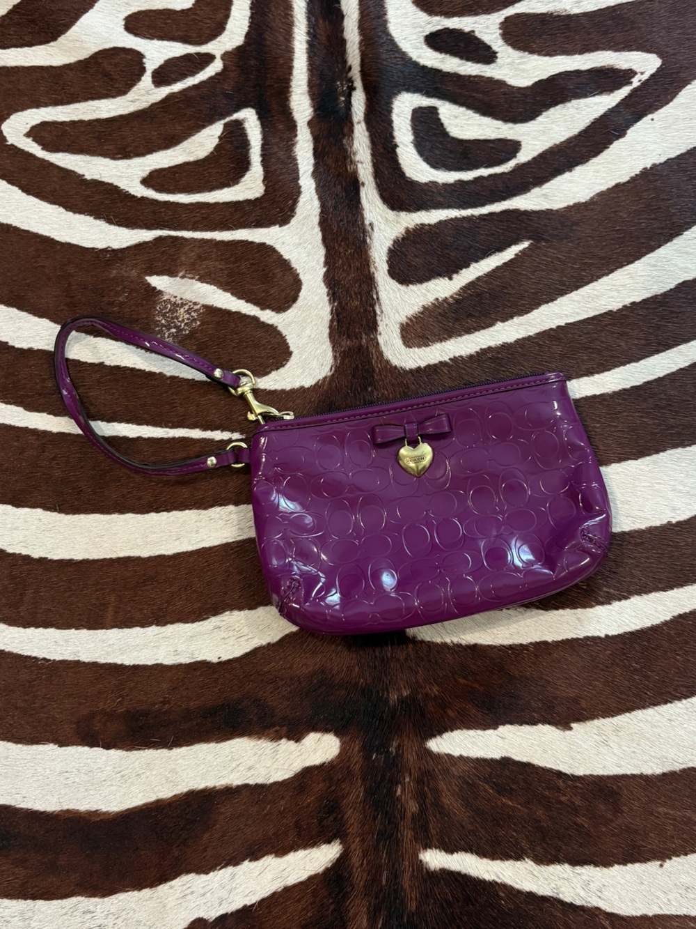 Coach Patent Leather Wristlet in Deep Purple with Gold Heart Charm